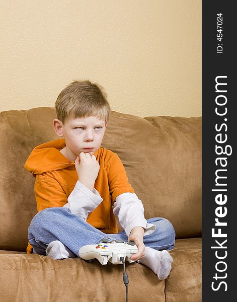 Young Boy Losing At Video Game