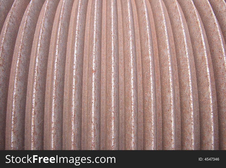 Close up detail of a large rusted steel cable pulley. Close up detail of a large rusted steel cable pulley