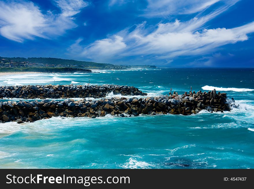 Waves crash on large Rocks. Waves crash on large Rocks