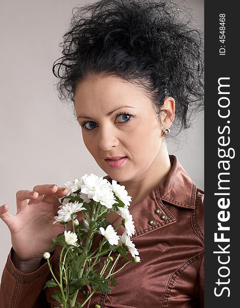 An image of beautiful woman with white flowers. An image of beautiful woman with white flowers