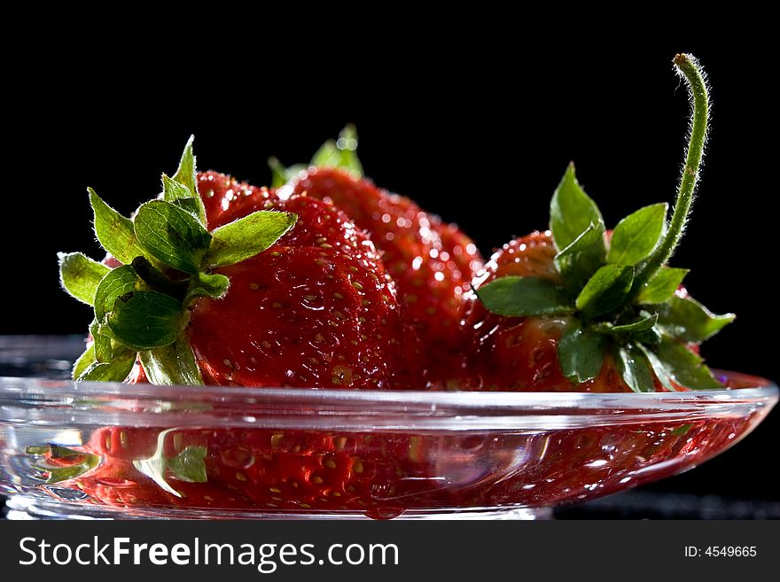 Food series: fresh ripe red strawberry on the plate