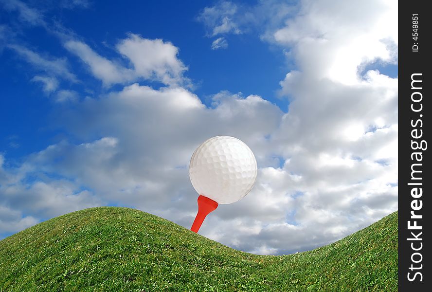 Golf ball on red tee on distorted grass. Golf ball on red tee on distorted grass