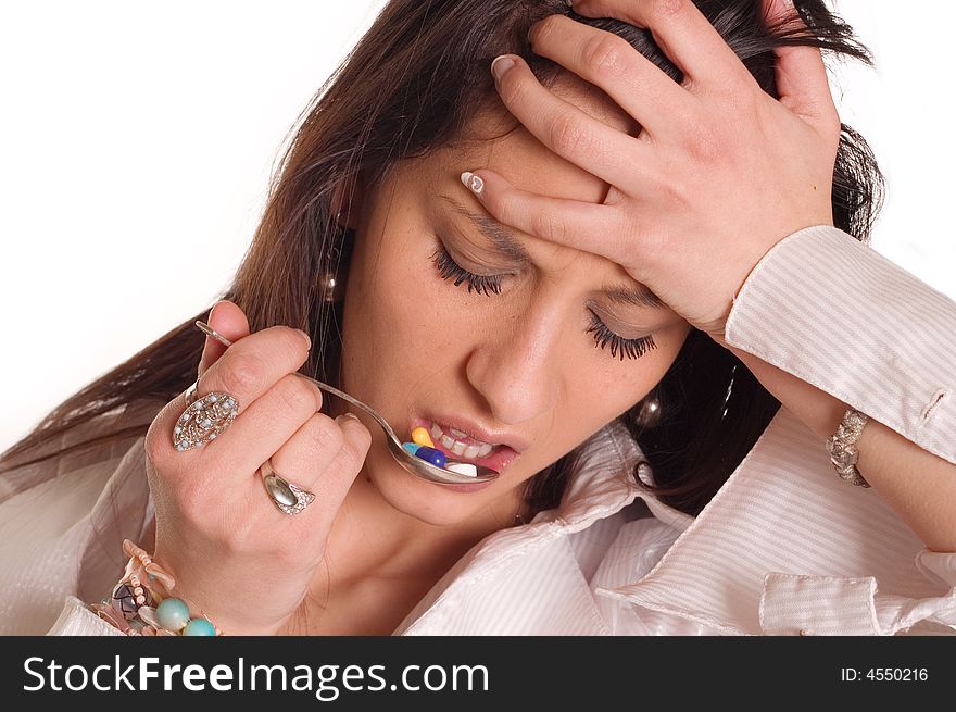 Young woman have a bad headache and using pills