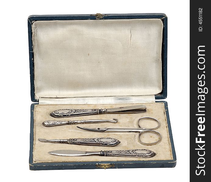 Isolated old antique object silver manicure set