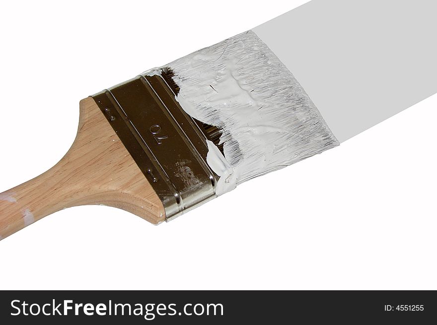 Paint brush with white paint on, isolated