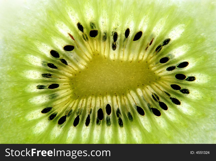 Green colourful kiwi with seeds. Green colourful kiwi with seeds