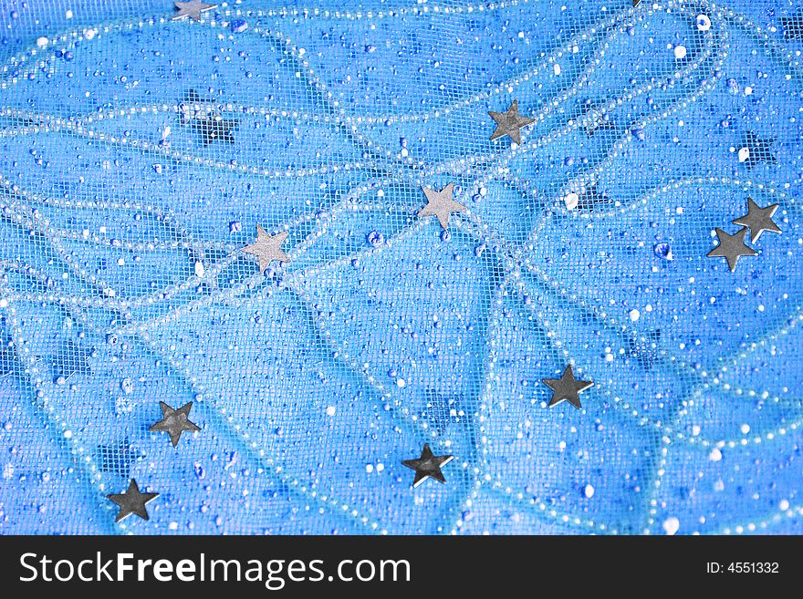 Beautiful blue background decorated with pearls and silver stars. Beautiful blue background decorated with pearls and silver stars