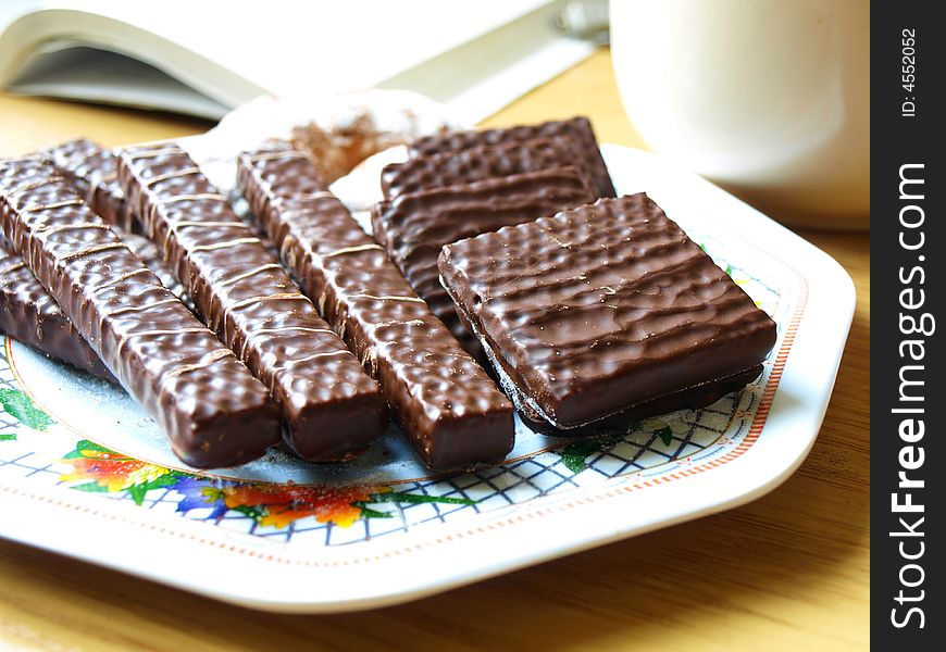Photo of chocolate wafers on colour plate