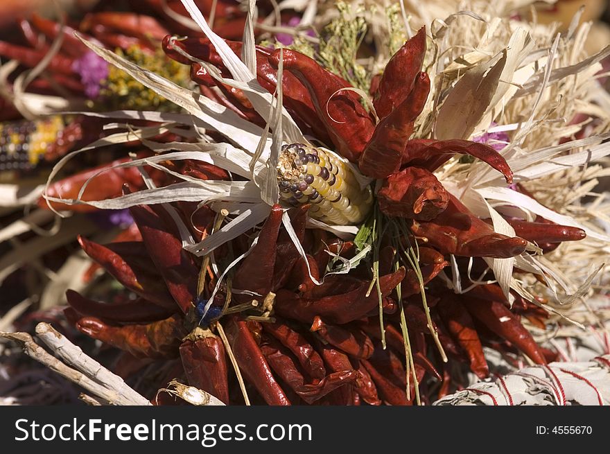 Red hot chile peppers and maize background