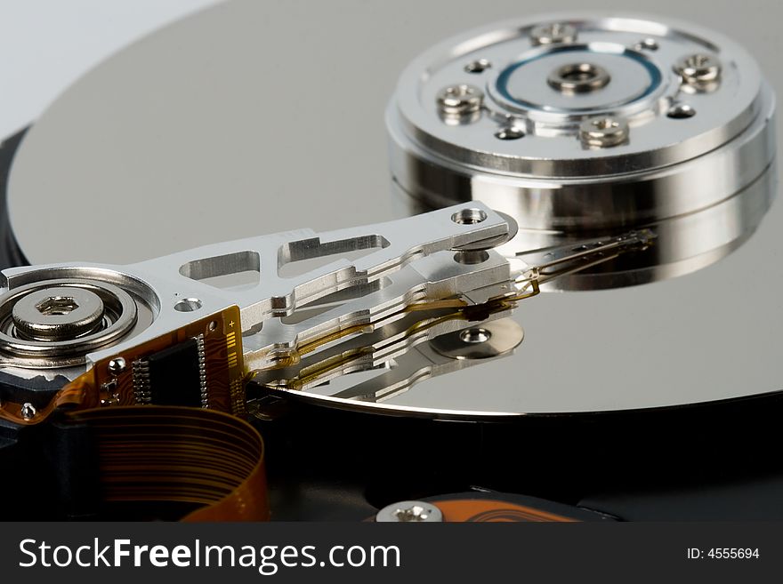 Closeup opened hard disk drive with smooth surface