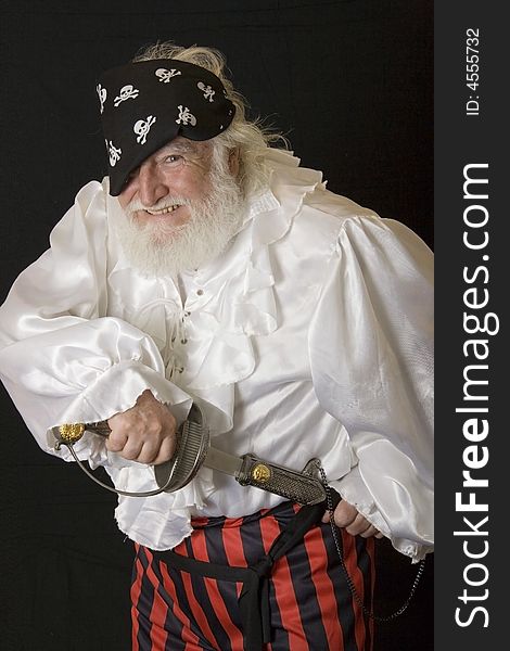 An old man dressed up like a pirate. An old man dressed up like a pirate