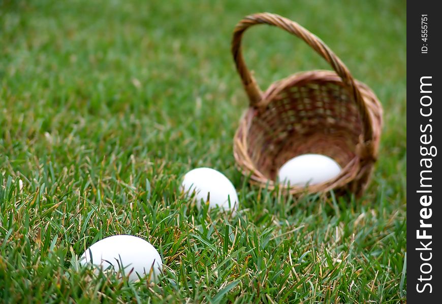 Three White Easter Eggs on the green grass. Three White Easter Eggs on the green grass