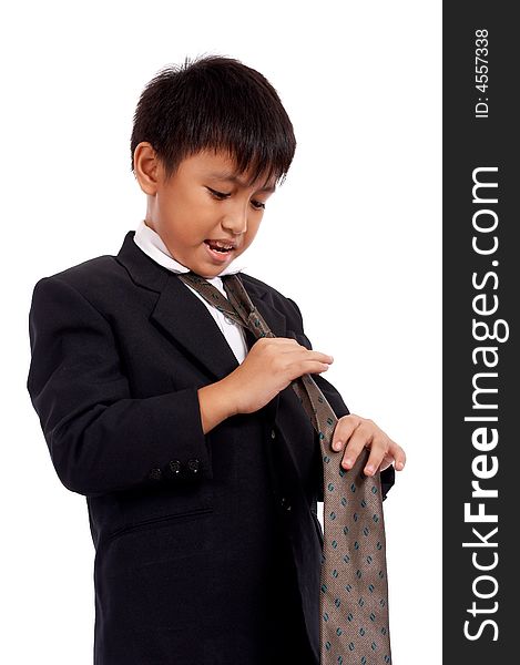 Handsome young secretary fixing his necktie