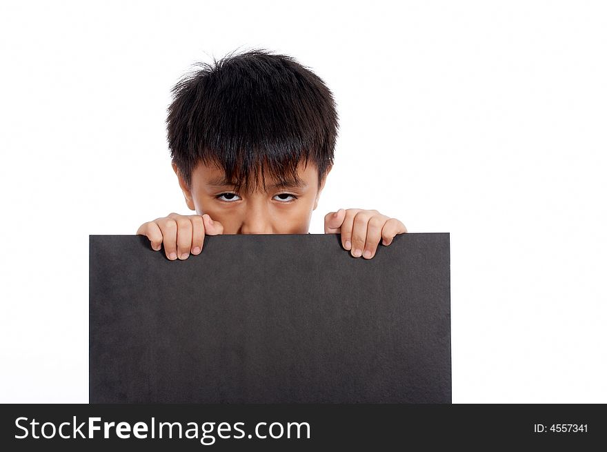 Sleepy young man holding a blank blackboard