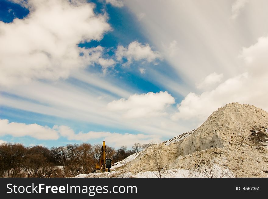 Storing collected snow in local park. Storing collected snow in local park