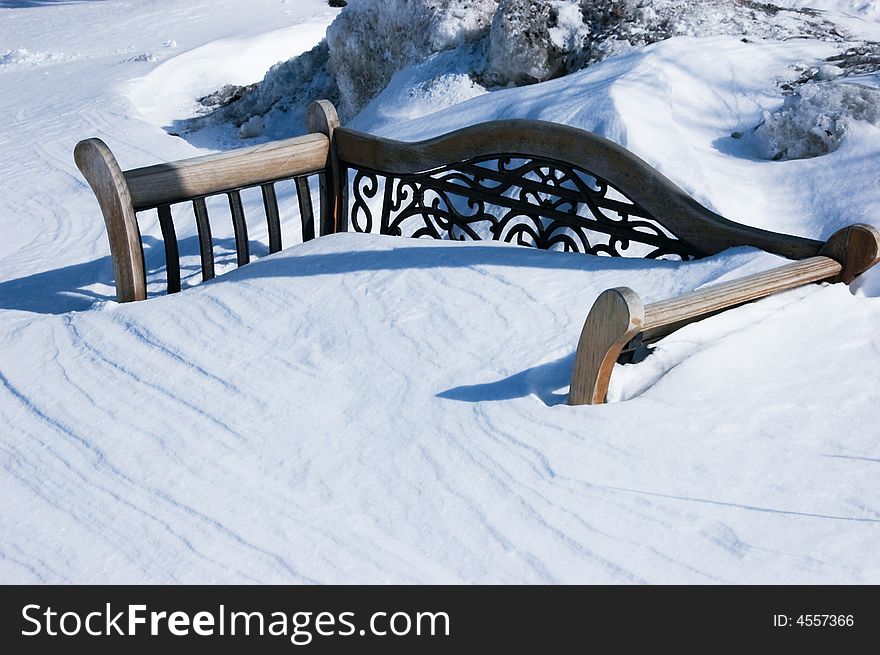 Abandoned bench on a cold winter day. Abandoned bench on a cold winter day