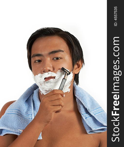 A man shaving over a white background