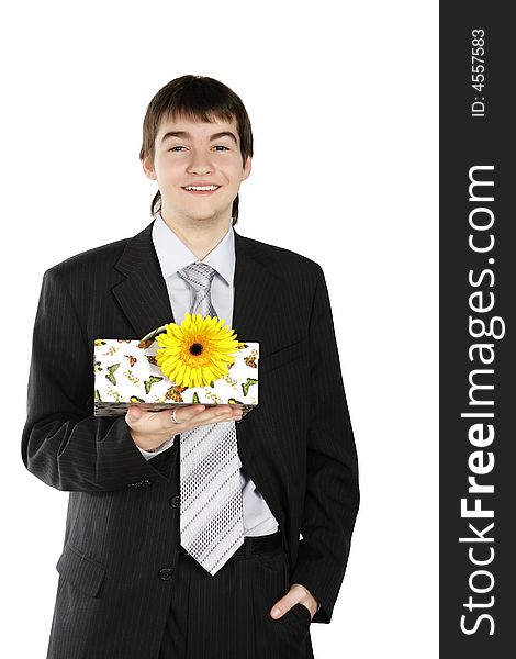 Boy With A Gift On The White Background