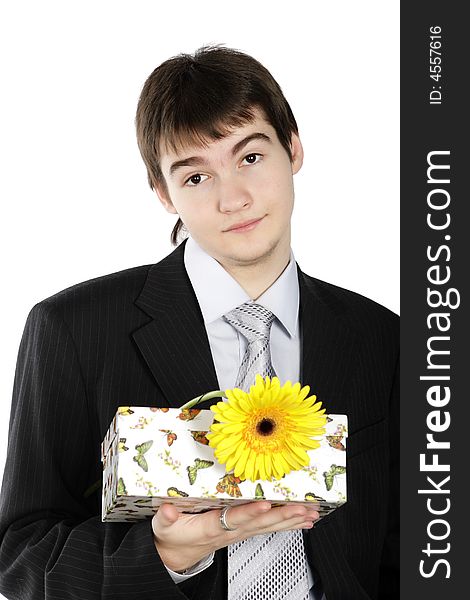 Boy With A Gift On The White Background