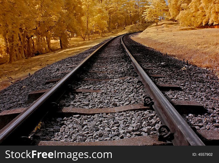 Infrared photo – railway, sky, landscape and tre