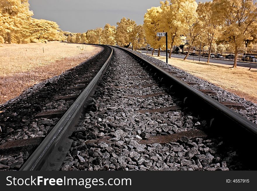 Infrared photo â€“ railway, sky, landscape and tree in the parks