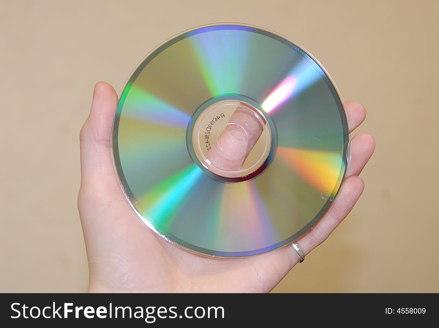 Hand with Audio or video cd
