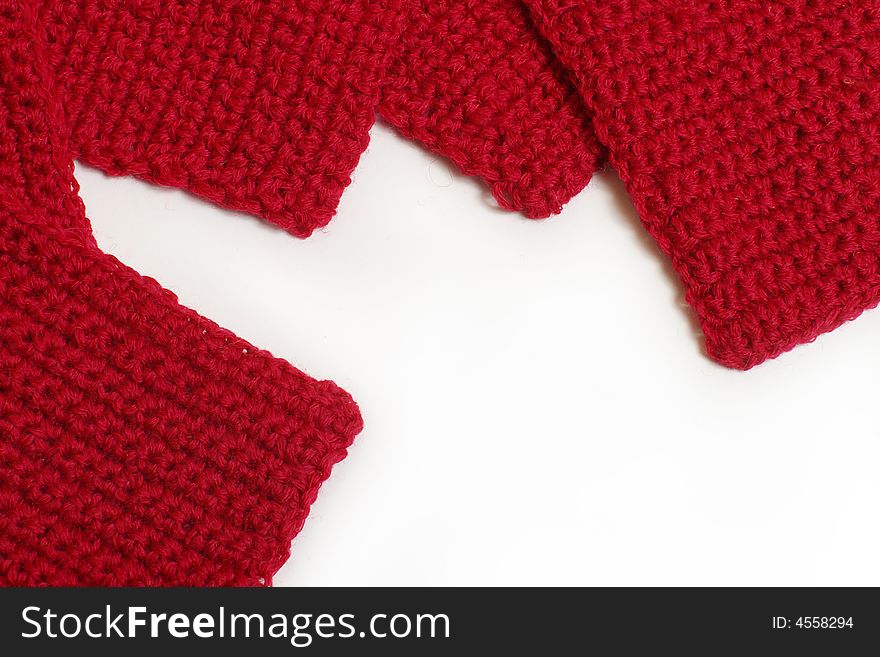 Knitting from a red wool close up