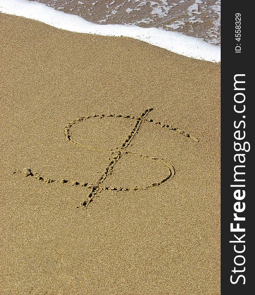 Dollar sign written on beach with tide approaching. Dollar sign written on beach with tide approaching