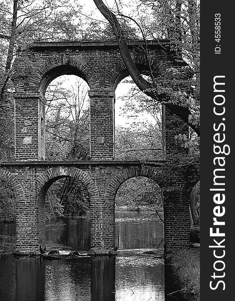 Antique roman aqueduct in black and white