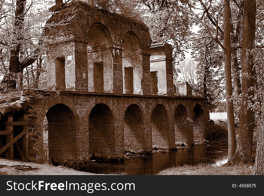 Antique roman aqueduct in sepia