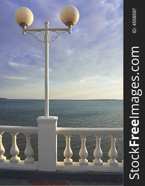 White streetlamp at the seashore