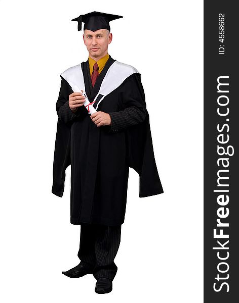 Young man in black graduation gown holding certificate of degree. Isolated over white background. Young man in black graduation gown holding certificate of degree. Isolated over white background.