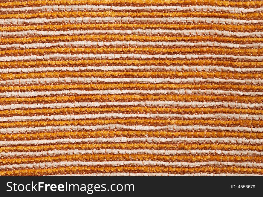 Macro of White, yellow and brown tightly woven fabric texture background. Macro of White, yellow and brown tightly woven fabric texture background