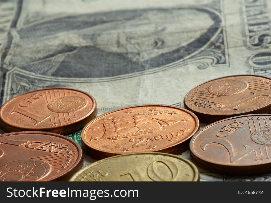 Money -  euro coins on one dollar banknote. Money -  euro coins on one dollar banknote