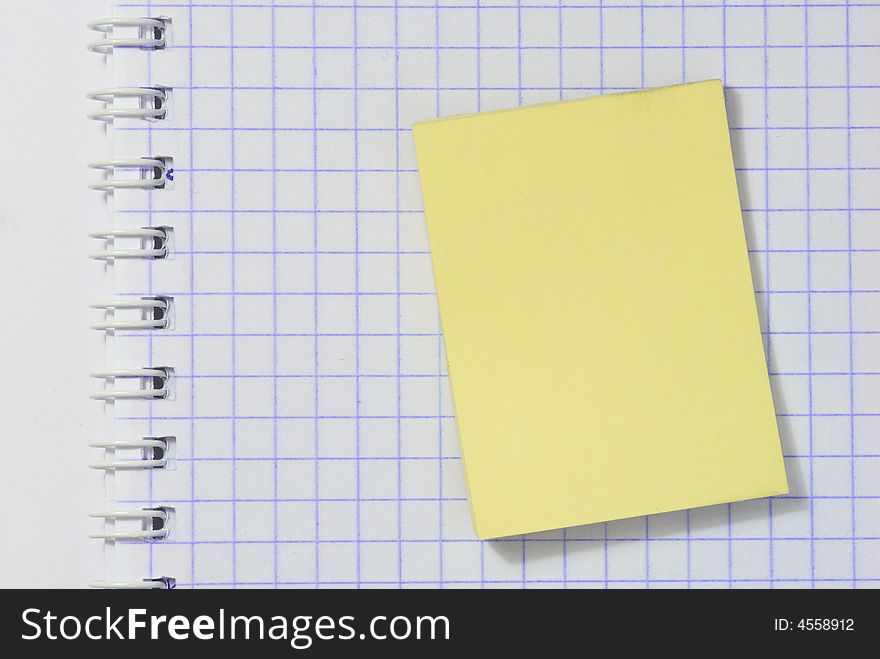 Yellow sticky notes on notebook