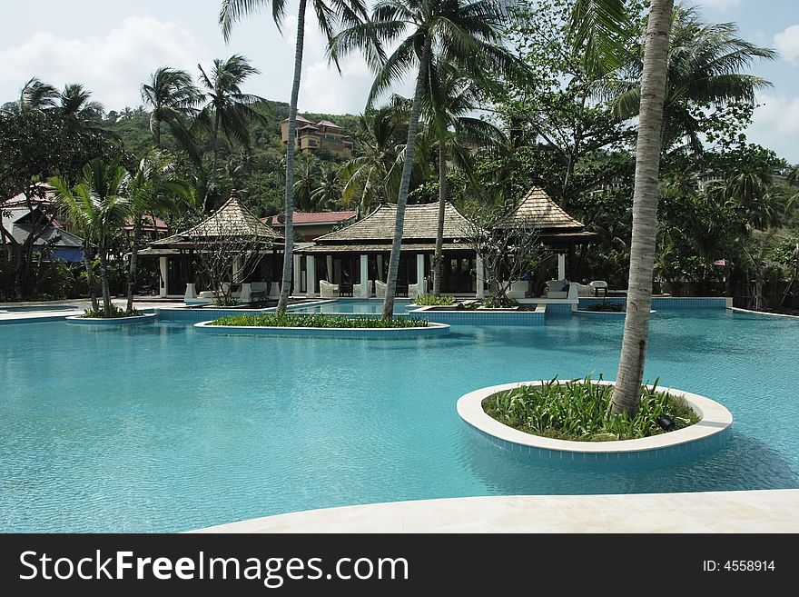 Tropical hotel with swimming pool. Tropical hotel with swimming pool.