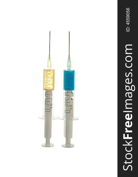 Blue and Gold Syringes with needles on white