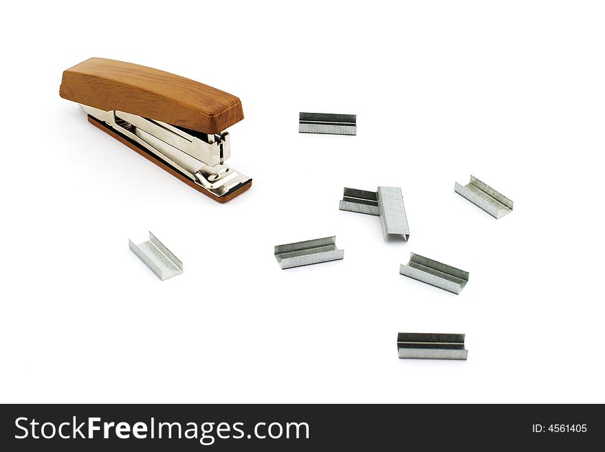 Isolated photo of stapler with some bars of staples. Isolated photo of stapler with some bars of staples