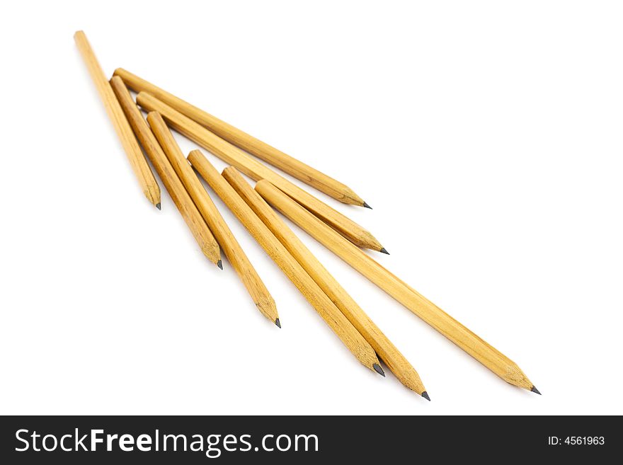 Isolated photo of eight wooden pencils