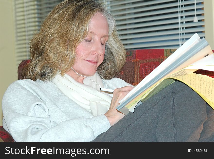 Businesswoman working on reports in her office.