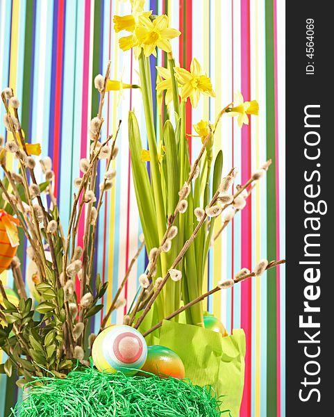 Easter floral arrangement on a coloured background. Easter floral arrangement on a coloured background.