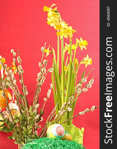 Easter floral arrangement on a red background. Easter floral arrangement on a red background.