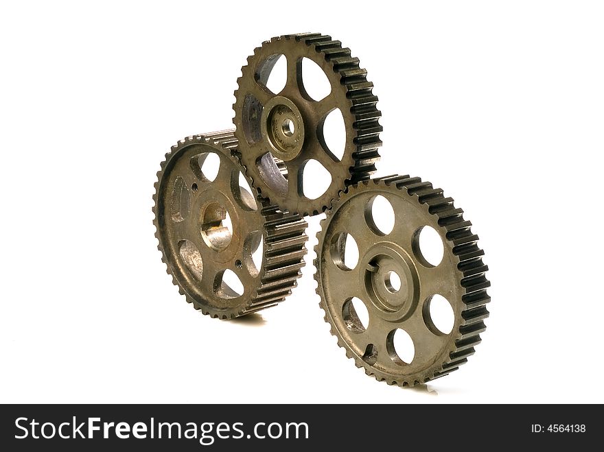 Four cogwheels isolated on white. Four cogwheels isolated on white