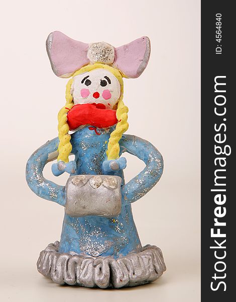 A terracotta figurine of a lady. A terracotta figurine of a lady