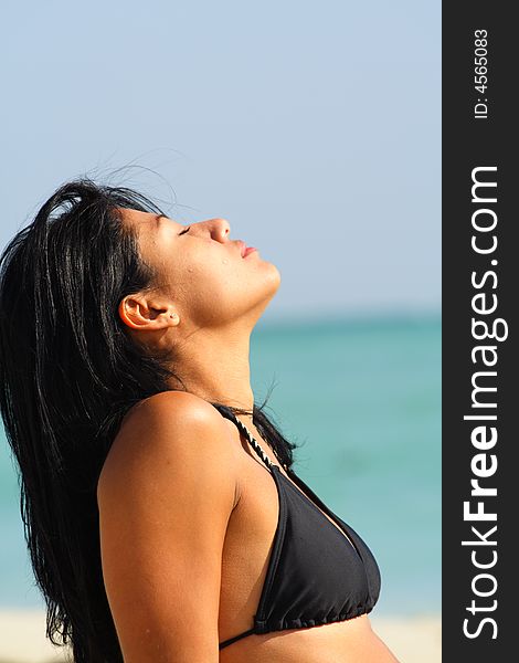 Beautiful young woman on the beach. Beautiful young woman on the beach