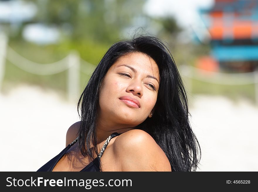 Woman on the Beach with blurry background