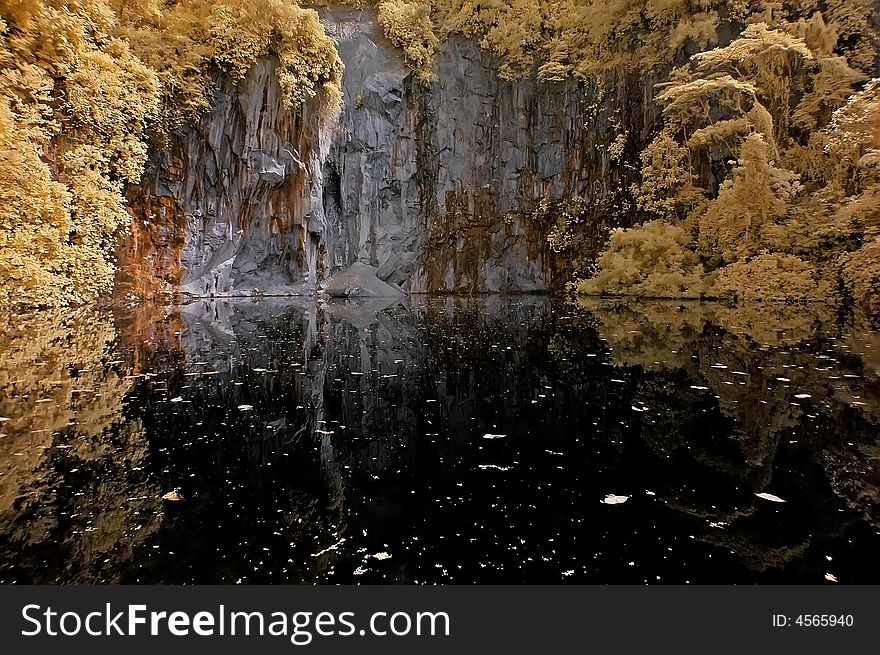 Infrared photo – lake, rock, reflection and tree in the parks