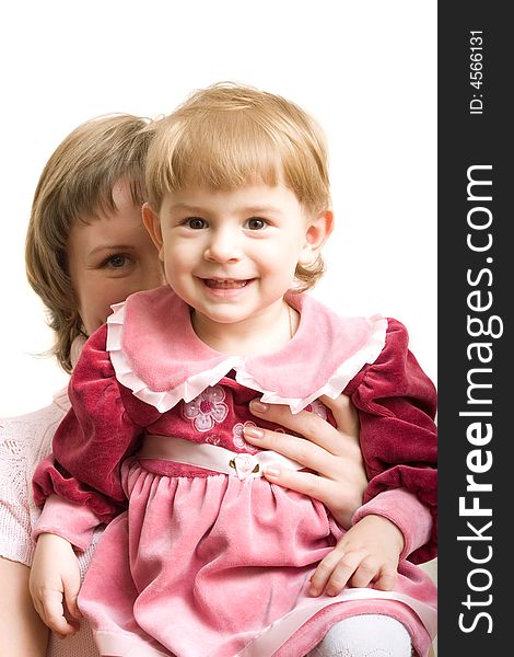 Cheerful mother and baby in formal dress