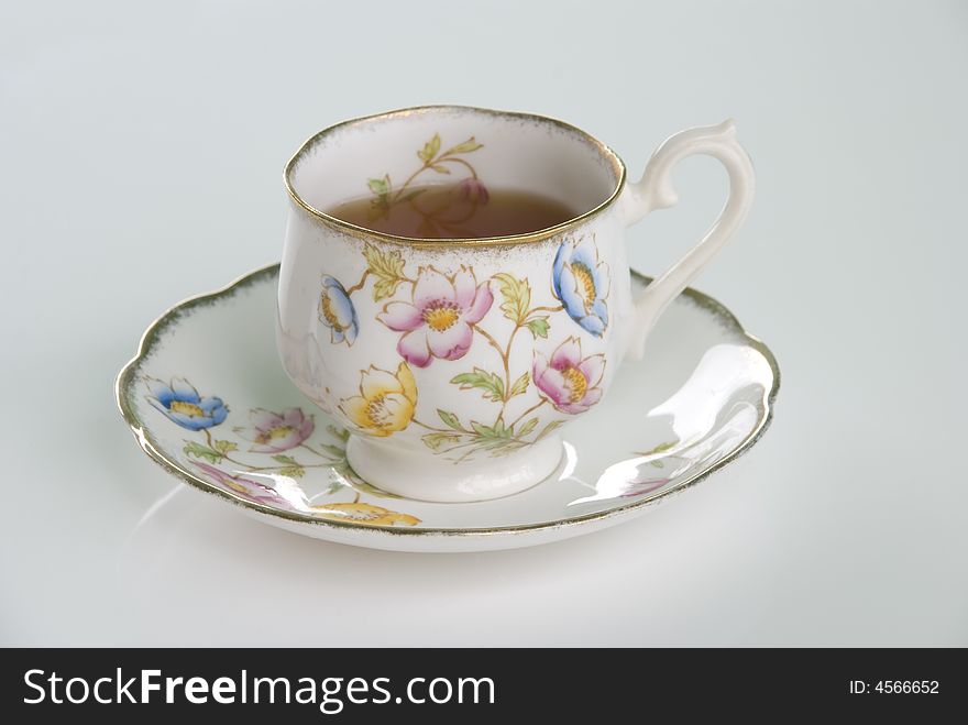 A beautiful old fashioned tea cup and saucer. A beautiful old fashioned tea cup and saucer