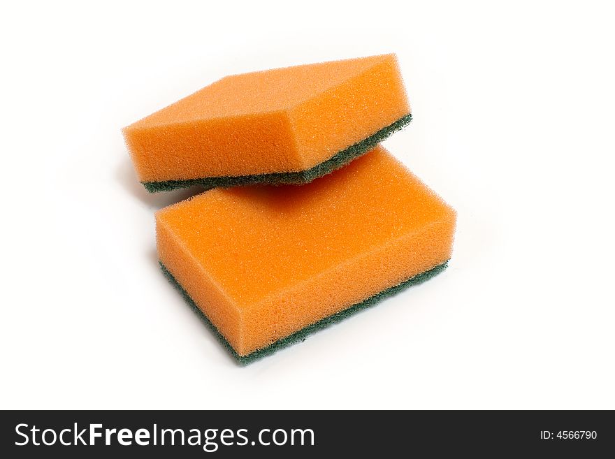 Two orange sponges for washing. Two orange sponges for washing